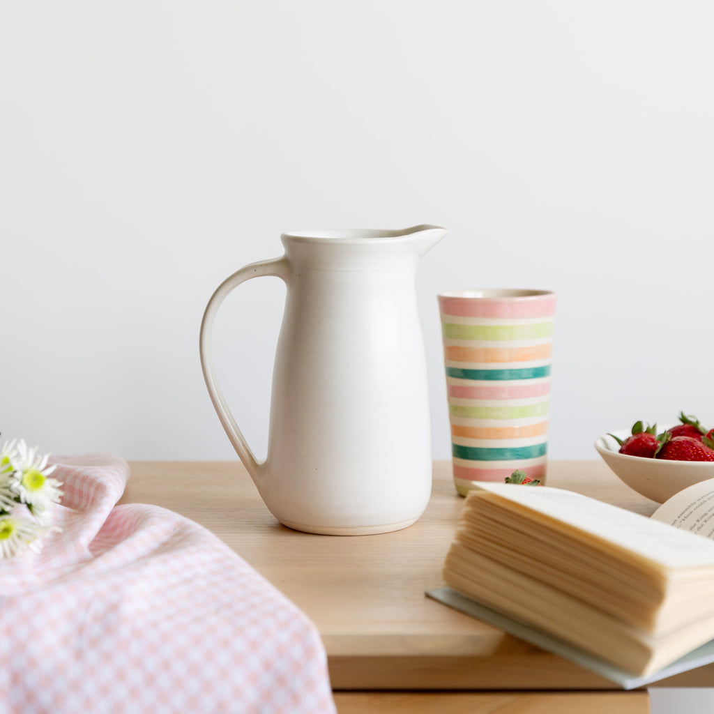 White ceramic pitcher, pourer, jug